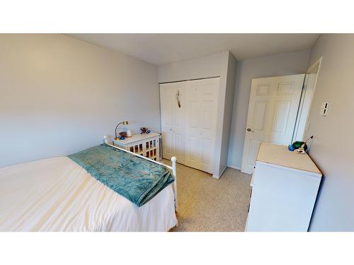 6 - 118 23Rd Avenue, Cranbrook, BC - Indoor Photo Showing Bedroom