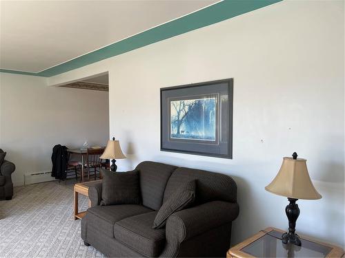 108 Heyes Street, Swan River, MB - Indoor Photo Showing Living Room