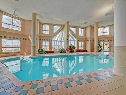 Piscine - 706-8050 Boul. St-Laurent, Brossard, QC - Indoor Photo Showing Other Room With In Ground Pool