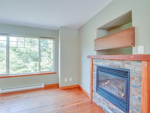 1865 St. Jacques Blvd, Ucluelet, BC - Indoor Photo Showing Living Room With Fireplace