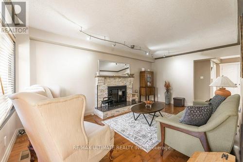 347 Alex Doner Dr, Newmarket, ON - Indoor Photo Showing Living Room With Fireplace