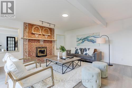 49 Druan Dr, Kawartha Lakes, ON - Indoor Photo Showing Living Room With Fireplace