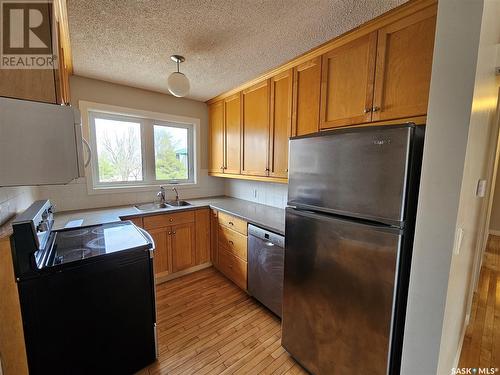 8 Burke Crescent, Swift Current, SK - Indoor Photo Showing Kitchen With Double Sink
