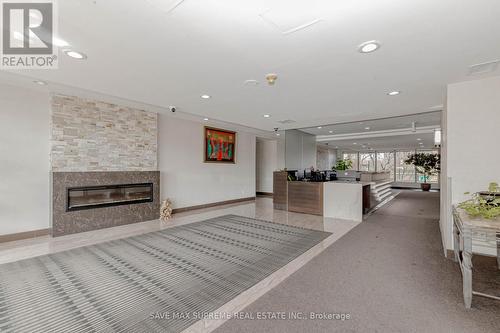 #211 -145 Hillcrest Ave, Mississauga, ON - Indoor With Fireplace
