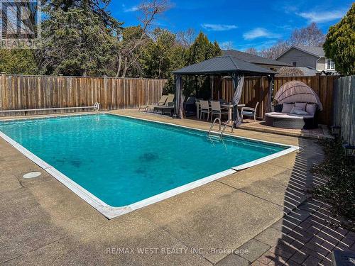 111 Poynter Dr, Toronto, ON - Outdoor With In Ground Pool With Deck Patio Veranda With Backyard