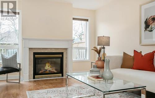 21 Harty Cres, Ajax, ON - Indoor Photo Showing Living Room With Fireplace