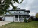 5615 Angus Court, Fort Nelson, BC  - Outdoor With Deck Patio Veranda With Facade 
