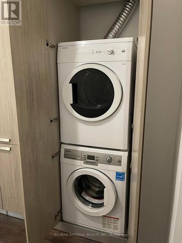 808 - 50 Charles Street E, Toronto, ON - Indoor Photo Showing Laundry Room