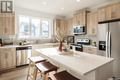 3071 Brighton Common, Saskatoon, SK - Indoor Photo Showing Kitchen With Upgraded Kitchen