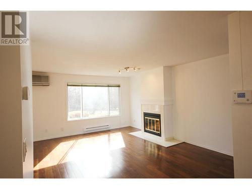 320 Brandon Avenue Unit# 107, Penticton, BC - Indoor Photo Showing Living Room With Fireplace