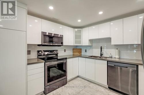 #1013 -1400 Dixie Rd W, Mississauga, ON - Indoor Photo Showing Kitchen With Double Sink