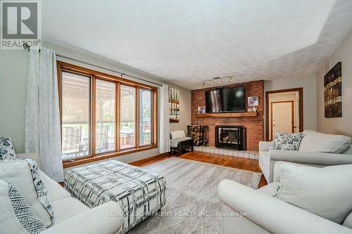 1930 West River Rd, North Dumfries, ON - Indoor Photo Showing Living Room With Fireplace