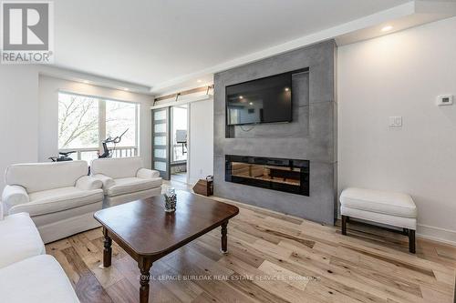 #301 -430 Pearl St, Burlington, ON - Indoor Photo Showing Living Room With Fireplace
