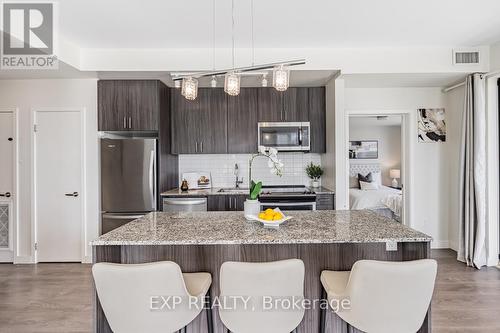 #113 -150 Sabina Dr, Oakville, ON - Indoor Photo Showing Kitchen With Stainless Steel Kitchen With Upgraded Kitchen