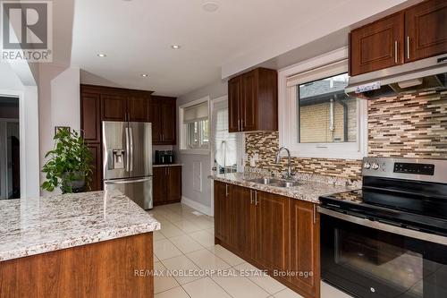 103 Exbury Rd, Toronto, ON - Indoor Photo Showing Kitchen With Double Sink