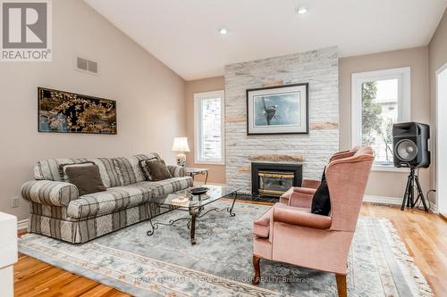 32 Park Trail, Springwater, ON - Indoor Photo Showing Living Room With Fireplace