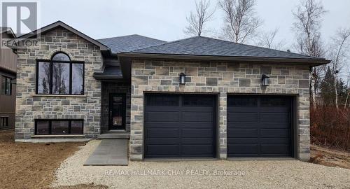 292 Robinson Road, Wasaga Beach, ON - Outdoor With Fireplace