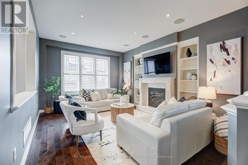 2 Debosky Crt, Whitby, ON - Indoor Photo Showing Living Room With Fireplace