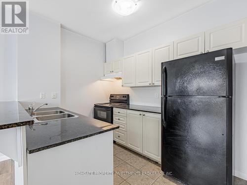 #104 -1 Sidney Lane, Clarington, ON - Indoor Photo Showing Kitchen With Double Sink