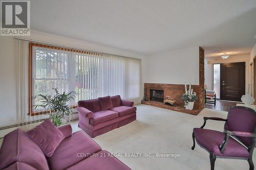 56 Somerdale Sq, Toronto, ON - Indoor Photo Showing Living Room With Fireplace