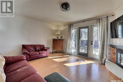 99 Arlington Street, Regina, SK - Indoor Photo Showing Living Room With Fireplace