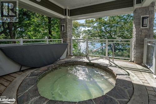 Hot tub at the Main Lodge - 1869 Muskoka Road 118 W Unit# G101-B1, Muskoka Lakes, ON - Outdoor