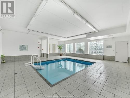 4789 Riverside Drive East Unit# 903, Windsor, ON - Indoor Photo Showing Other Room With In Ground Pool