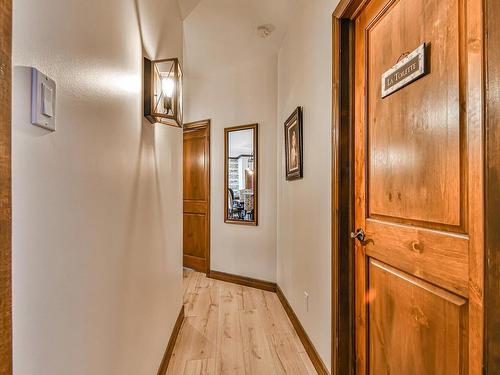 Corridor - 4-250 Rue Du Mont-Plaisant, Mont-Tremblant, QC - Indoor Photo Showing Other Room With Fireplace