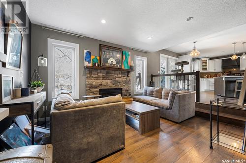 8222 Rankin Drive, Regina, SK - Indoor Photo Showing Living Room With Fireplace