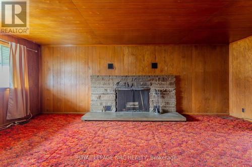 3766 Crystal Beach Drive, Fort Erie, ON - Indoor Photo Showing Living Room With Fireplace