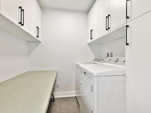 Laundry room - 4515 Rue Domville, Longueuil (Saint-Hubert), QC - Indoor Photo Showing Laundry Room