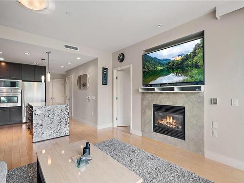 204-3223 Selleck Way, Colwood, BC - Indoor Photo Showing Living Room With Fireplace