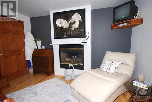 11 Fairway Drive, Petawawa, ON - Indoor Photo Showing Bedroom With Fireplace