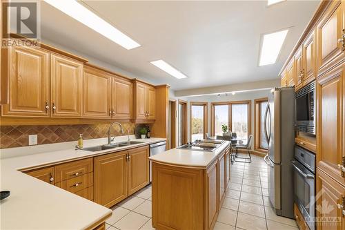1085 Moffatt Drive, Cumberland, ON - Indoor Photo Showing Kitchen With Double Sink