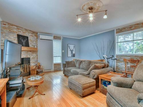 Living room - 3493 Ch. Du Village, Saint-Adolphe-D'Howard, QC - Indoor Photo Showing Living Room With Fireplace