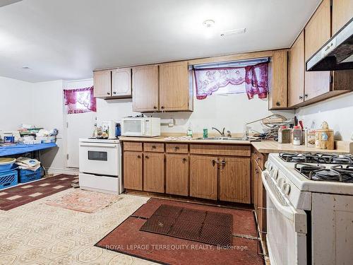 30 Lilac Ave, Toronto, ON - Indoor Photo Showing Kitchen With Double Sink