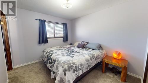 10663 102 Street, Taylor, BC - Indoor Photo Showing Bedroom