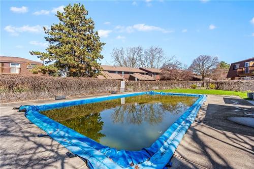 122 Lakeshore Road|Unit #8, St. Catharines, ON - Outdoor With In Ground Pool