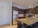 216-1350 Ridgeway Drive, Kelowna, BC  - Indoor Photo Showing Kitchen With Double Sink 