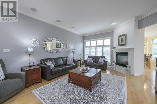 45 Wynfield Lane, London, ON - Indoor Photo Showing Living Room With Fireplace