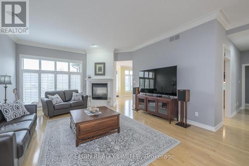 45 Wynfield Lane, London, ON - Indoor Photo Showing Living Room With Fireplace