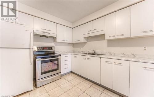 565 Greenfield Avenue Unit# 406, Kitchener, ON - Indoor Photo Showing Kitchen With Double Sink