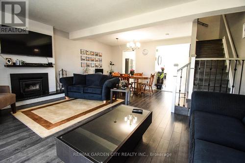 #31 -77 Linwell Rd, St. Catharines, ON - Indoor Photo Showing Living Room With Fireplace