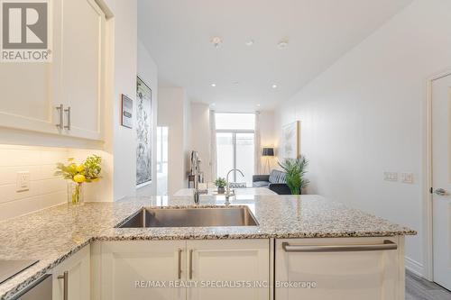 #101 -1050 Main St E, Milton, ON - Indoor Photo Showing Kitchen With Upgraded Kitchen