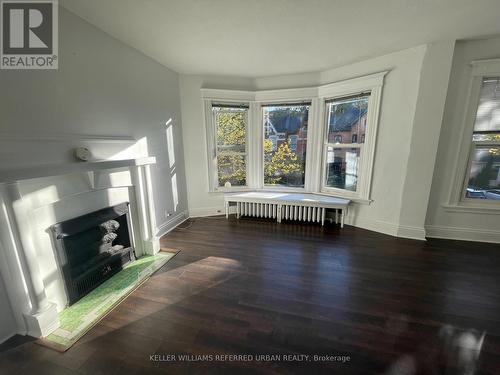 148 Markland Street, Hamilton, ON - Indoor Photo Showing Living Room With Fireplace