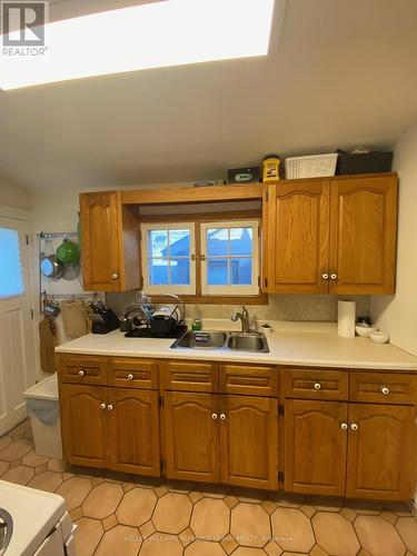 148 Markland St, Hamilton, ON - Indoor Photo Showing Kitchen With Double Sink