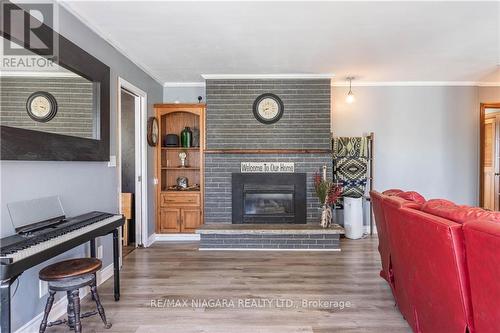 4155 15Th Street, Lincoln, ON - Indoor Photo Showing Living Room With Fireplace