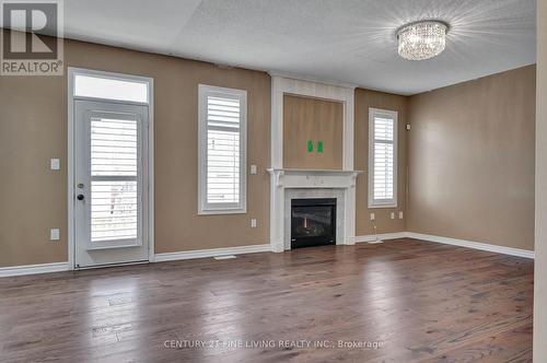 240 Chilver Hts, Milton, ON - Indoor Photo Showing Living Room With Fireplace
