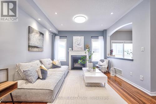 4770 Deforest Crescent, Burlington, ON - Indoor Photo Showing Living Room With Fireplace