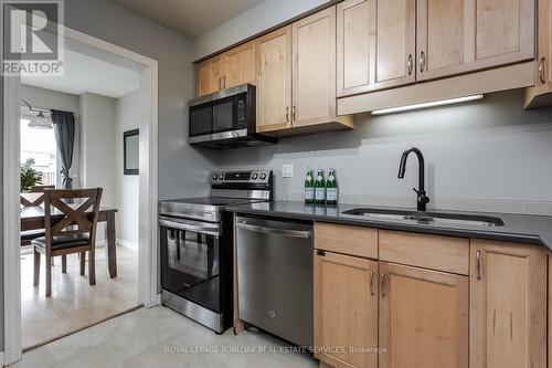 #48 -2470 Headon Forest Dr, Burlington, ON - Indoor Photo Showing Kitchen With Double Sink